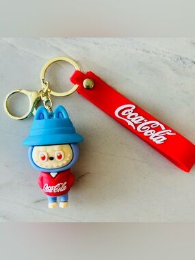 Coca Cola Blue & Red Character Keyring with Branded Red Strap